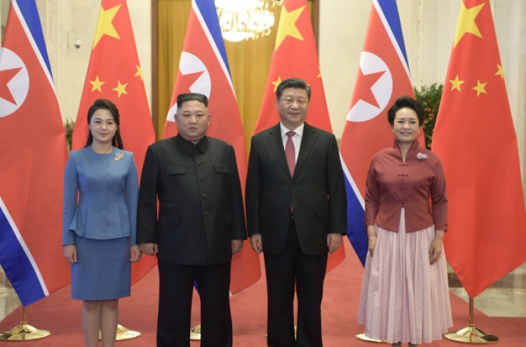 Kim reaffirms commitment to denuclearization in meeting with Xi