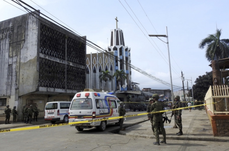 20 dead as bombs target Sunday Mass in Philippine cathedral