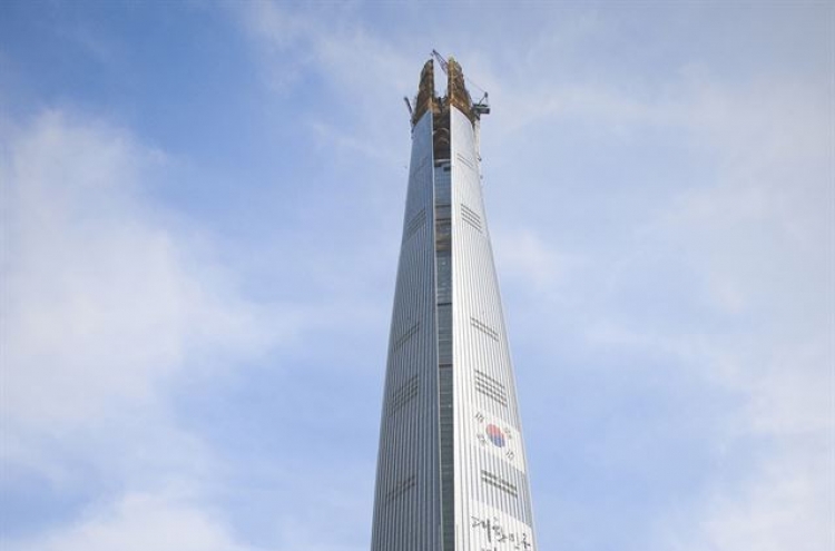 [Sky’s the Limit] Lotte World Tower, witness to group’s twist and turns