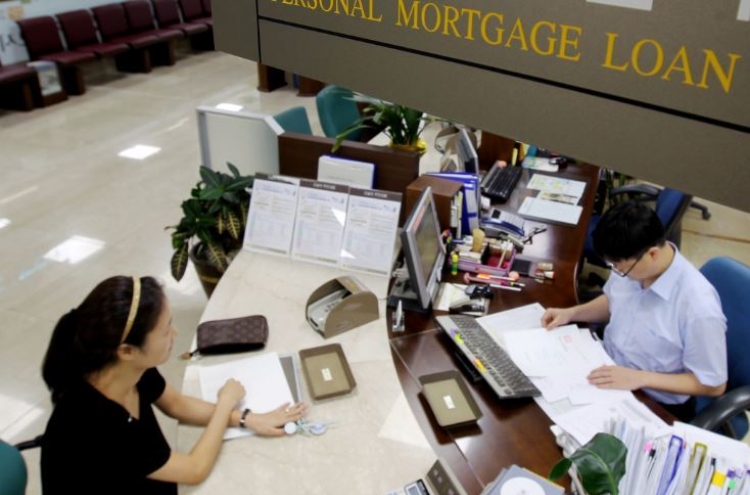 [News Focus] Real estate mortgages hinder economic growth
