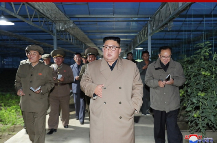 North Korean leader visits farm, calls for stable food supply