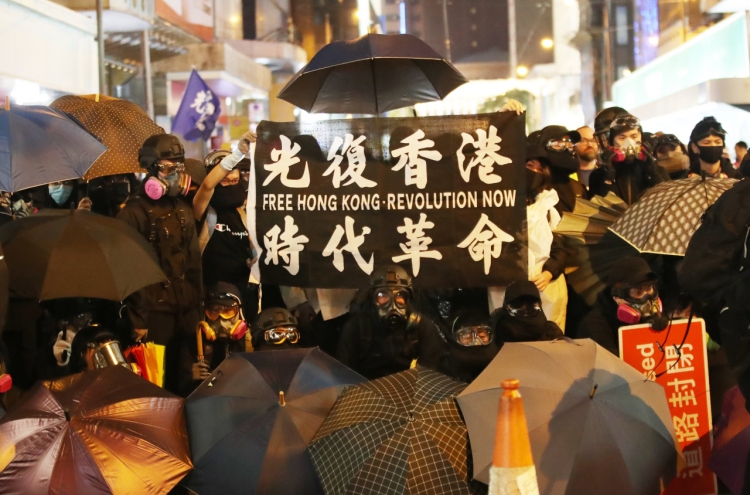 Hong Kongers mark half a year of protest with mammoth rally