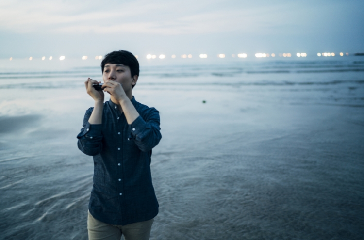 [Herald Interview] Playing harmonica more than a hobby