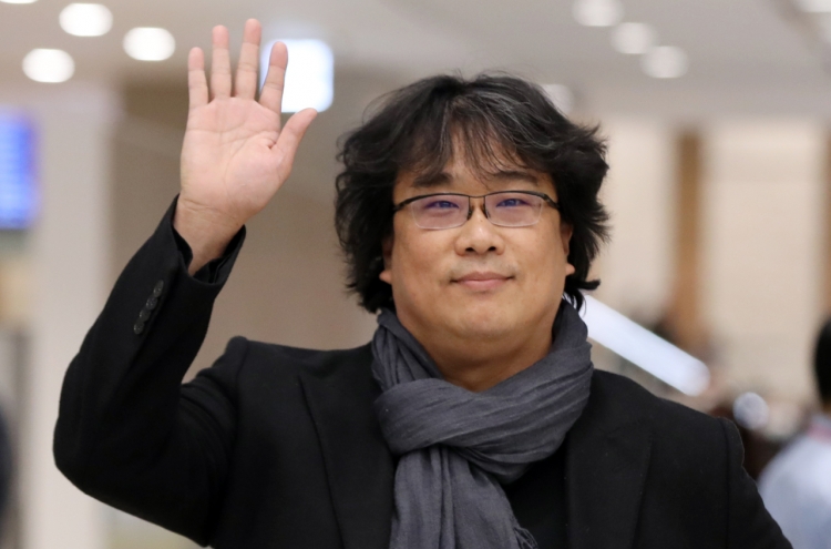 Oscar-winning director Bong Joon-ho returns home to hero's welcome