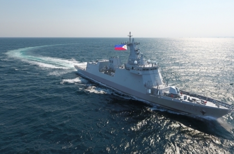 [Photo News] Frigate departs with masks