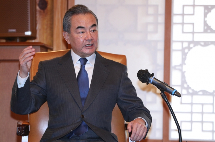 Wang stresses two Koreas should determine peninsula’s fate