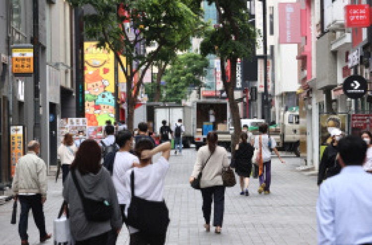 Koreans can ditch masks outdoors after first COVID-19 shot