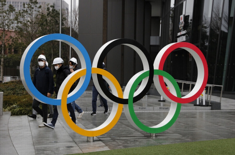 Tokyo elects assembly amid pandemic fears over Olympics