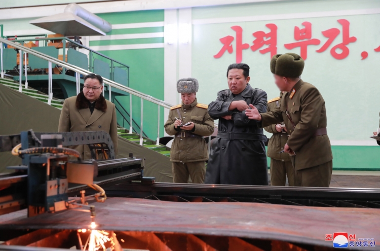 NK confirms missile tests as Kim Jong-un visits munitions factory