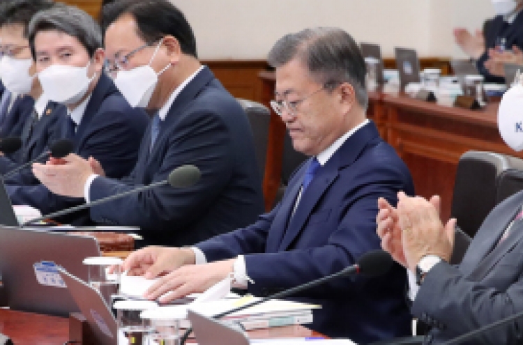 Moon Jae-in signs controversial prosecution bills into law