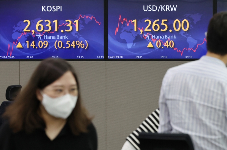 Seoul shares open higher on Fed minutes