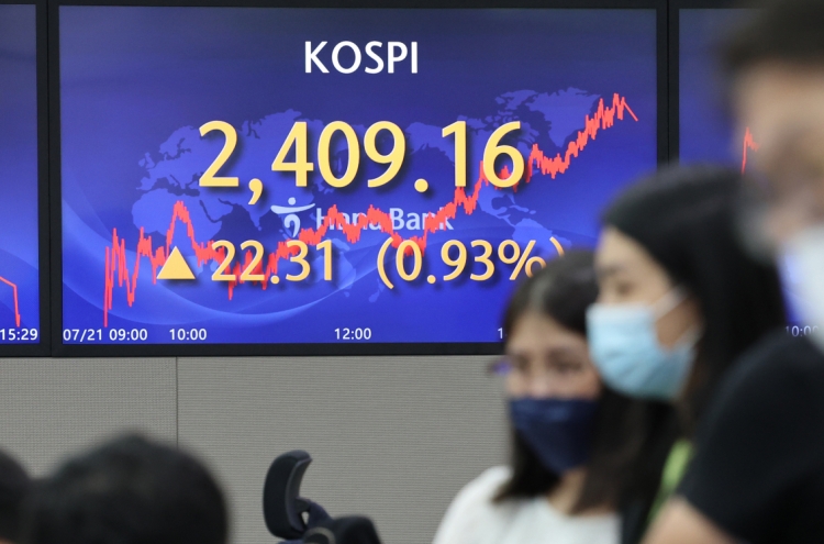 Seoul shares open slightly higher on US gains