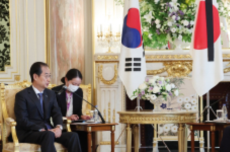 S. Korean PM meets with Japan's Kishida, urges to improve relations