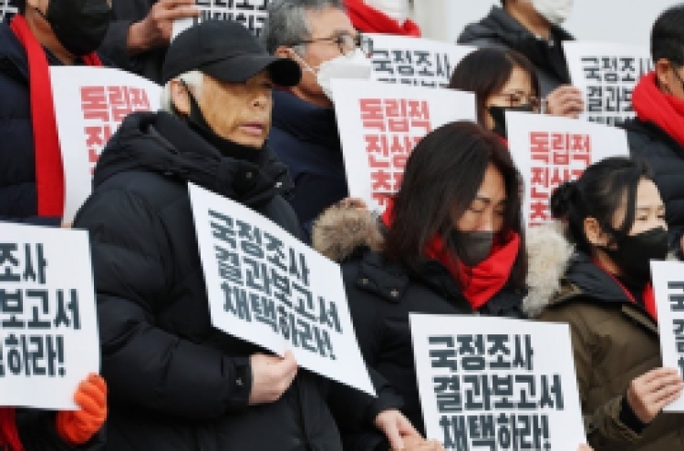 Bereaved father collapses as Itaewon disaster probe ends in partisan row