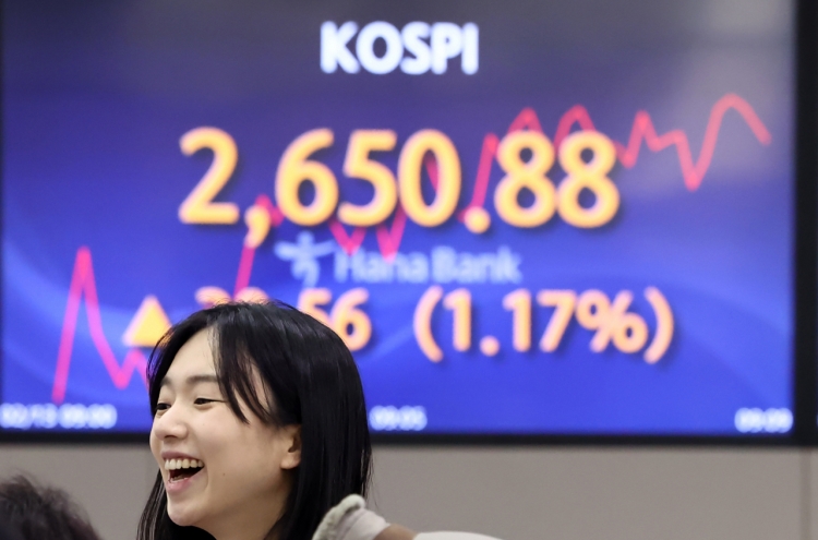 Seoul shares open higher amid rate cut hopes