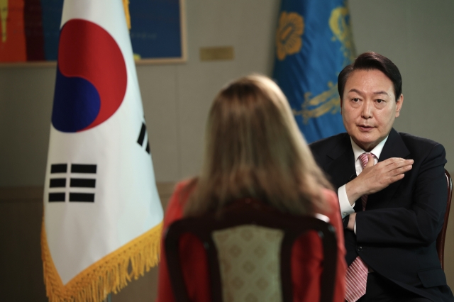 President Yoon Suk-yeol speaks during an interview with CNN at the presidential office in Seoul on Monday, in this photo provided by the office. (The presidential office)