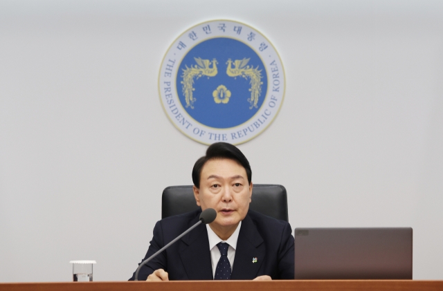 President Yoon Suk-yeol presides over a Cabinet meeting at the Yongsan Presidential Office in Seoul on Tuesday. (Yonhap)