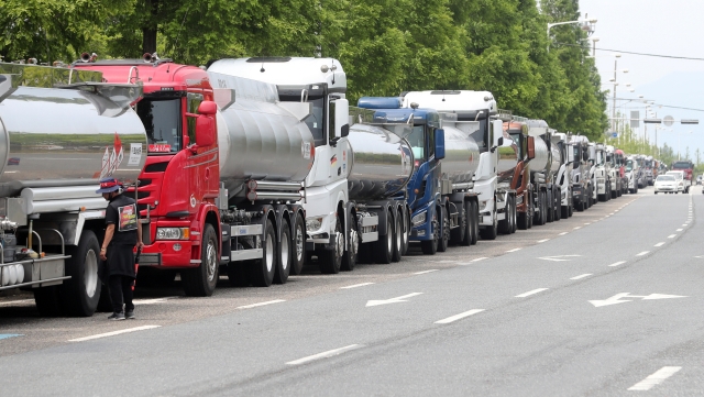 Cargo trucks are parked at Yeosu National Industrial Complex on June 9. (Yonhap)