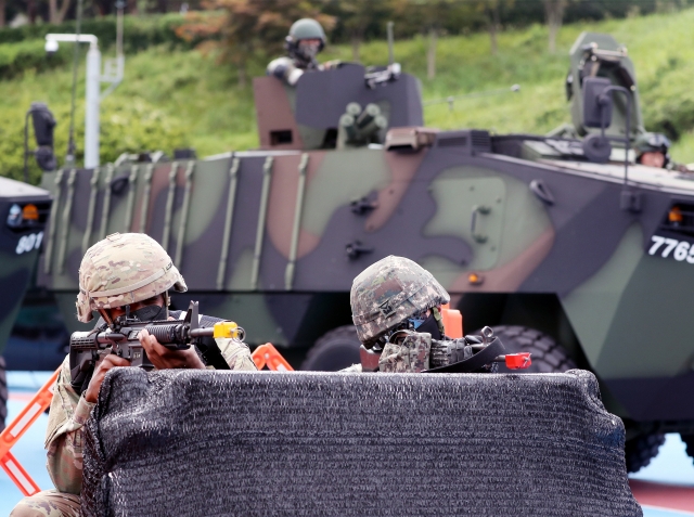 This photo, taken on Monday, shows South Korean and US troops engaging in the Ulchi Freedom Shield exercise in the southeastern port city of Busan. (Yonhap)