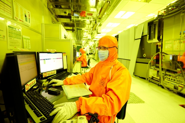 An employee works inside a semiconductor chip plant of SK hynix in this undated photo. (SK hynix)