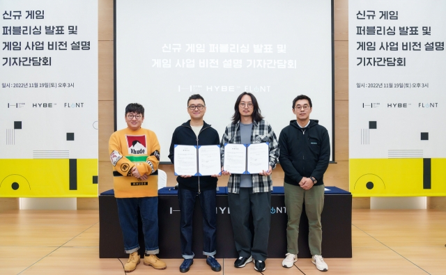 From left: Hybe Chairman Bang Si-hyuk, Flint CEO Kim Young-mo, Hybe IM CEO Jeong Woo-yong, Hybe CEO Park Ji-won pose for a picture on Saturday after speaking to reporters at a press conference held in Busan. (Yonhap)