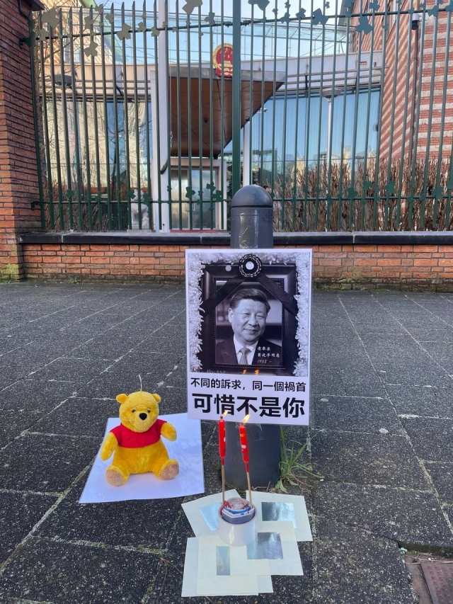 A one-person white-paper protest is held in The Hague, Netherlands, on Saturday. (courtesy of reader)