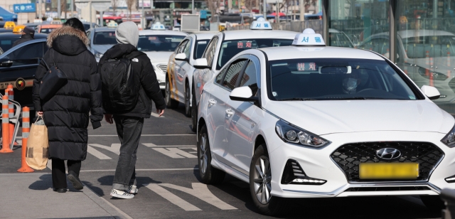 Taxis in Seoul. Yonhap