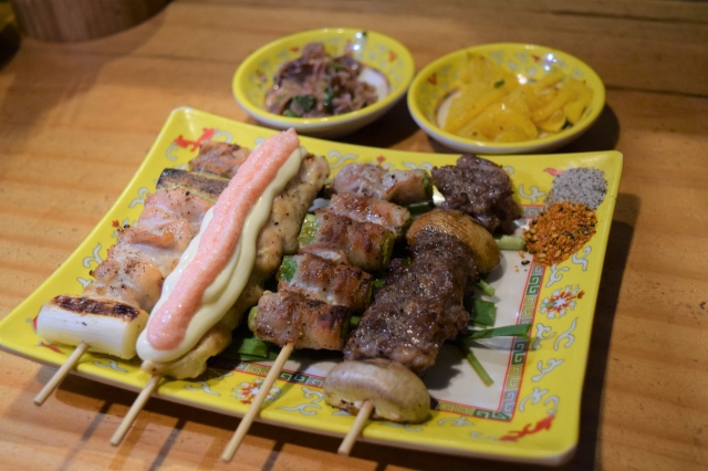 (From left) Chicken drumsticks, salted pollack roe with chicken tenderloin, asparagus with pork belly and beef ribs' skewers