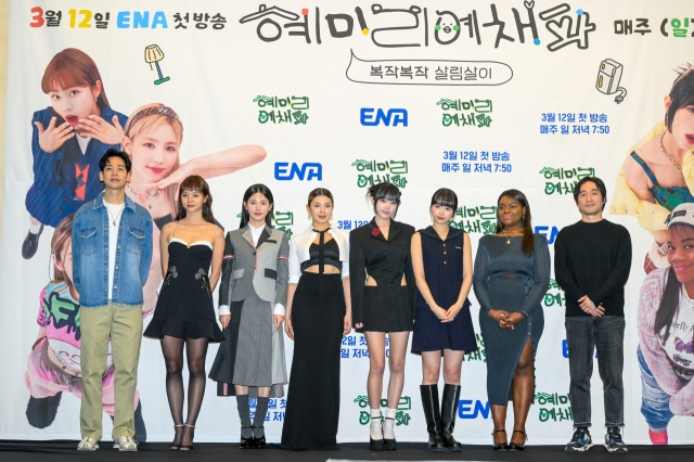 From left: Director Lee Tae-kyung, singer-turned-actor Hyeri, Miyeon of (G)I-dle, Leejung of dance crew YGX, vocalist Choi Yena, Chaewon of Le Sserafim, TV personality Patricia and director Kim Jong-moo pose for photos before a press conference held at Stanford Hotel Seoul in Mapo-gu, western Seoul on Thursday. (ENA)