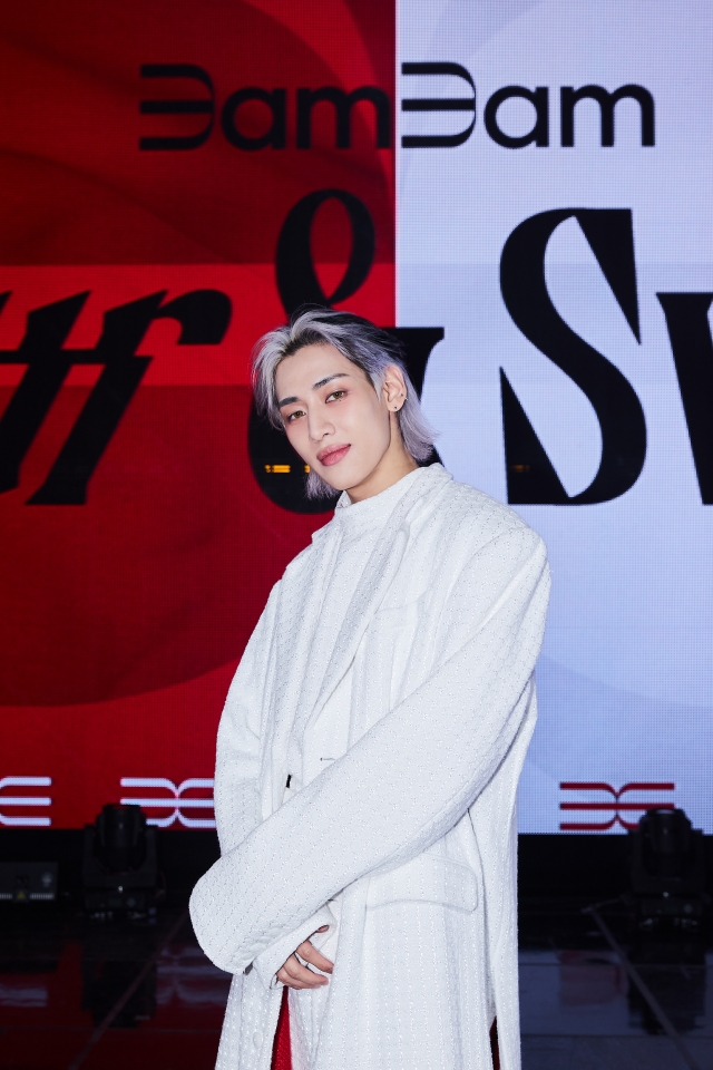 K-pop singer BamBam poses for picture during a press conference for his first LP