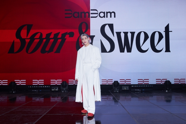 K-pop singer BamBam poses for picture during a press conference for his first LP