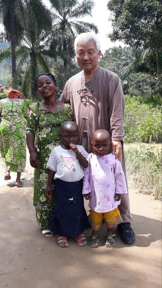 Rev. Choi with a Twa family