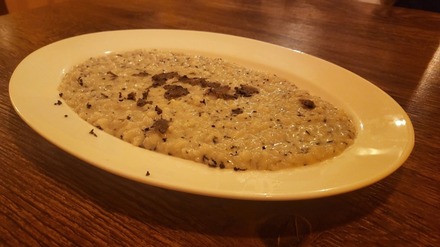 Parmesan risotto with truffles served at Ristorante Il Chiasso (Kim Hae-yeon/ The Korea Herald)