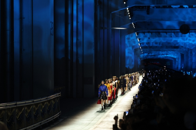 Models walk on Jamsu Bridge over the Han River in Seoul, which was turned into a runway for the Louis Vuitton pre-fall fashion show on Saturday. (Louis Vuitton)