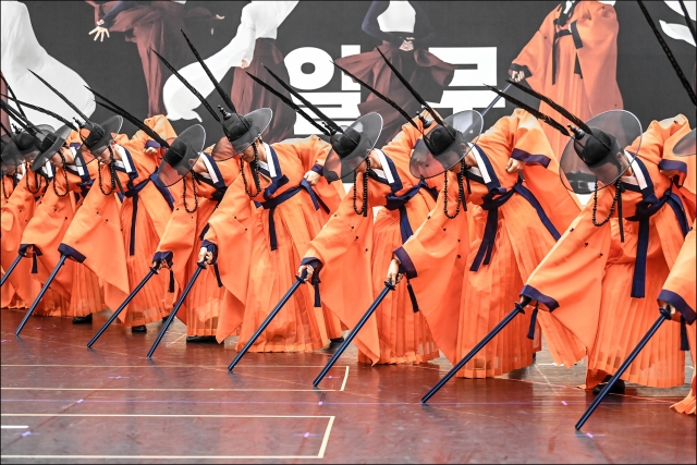 Male dancers of the Seoul Metropolitan Dance Theatre rehearse 