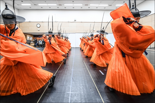 Male dancers of the Seoul Metropolitan Dance Theatre rehearse 