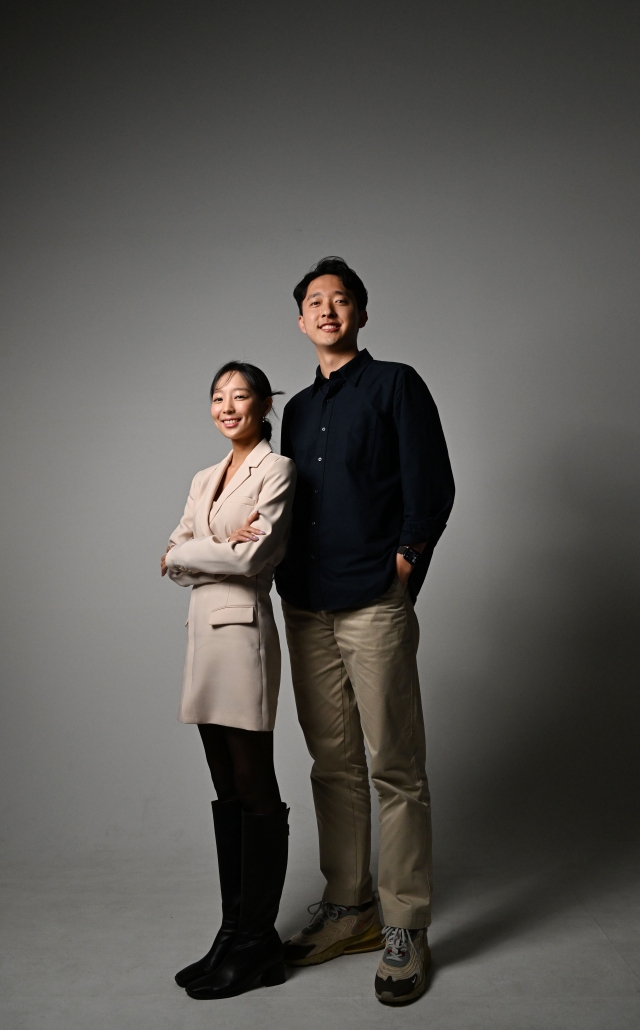 DayTrip co-CEOs Lee Ji-eun (left) and Yoon Seok-jun pose for a picture during an interview with The Korea Herald in Seoul on Friday. (Park Hae-mook/The Korea Herald)