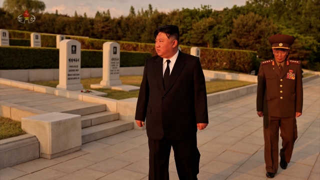 North Korean leader Kim Jong-un pays respect to the late former military official Hyon Chol-hae on May 19. (North Korean Central Television).