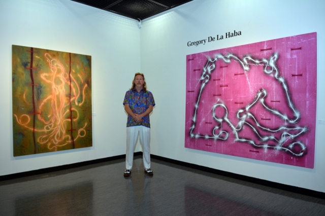 Gregory de la Haba poses with his work at Hangaram Art (Gregory de la Haba )