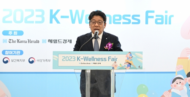 The Korea Herald CEO Choi Jin-young gives a welcome speech during the opening ceremony of the 2023 K-wellness fair at the Suwon Convention center in Suwon, Gyeonggi Province, on Friday. (Im Se-jun/The Korea Herald)