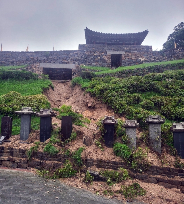 Soil loss is pictured in front of the Geumseoru gate at Gongsanseong in Gongju, South Chungcheong Province, on Saturday. (Yonhap)