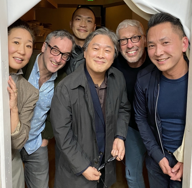 From left: Actor Sandra Oh, head writer Don McKellar, interpreter Jaehuen Chung, director Park Chan-wook, producer Niv Fichman and writer Viet Thanh Nguyen in March 2020. (Courtesy of Viet Thanh Nguyen)