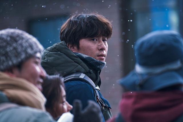 Park Seo-joon stars as Min-sung in “Concrete Utopia.” (Lotte Entertainment)