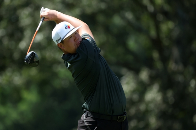 Im Sung-jae of South Korea tees off on the seventh hole during the final round of the FedEx St. Jude Championship at TPC Southwind in Memphis on Saturday. (Getty Images)