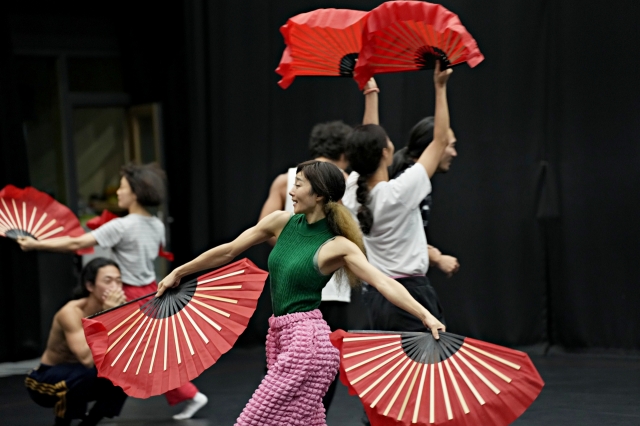 Dancers rehearse a scene from 