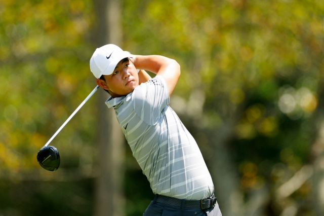 Tom Kim of South Korea plays his shot from the fifth tee during the second round of the TOUR Championship at East Lake Golf Club on Aug.25 in Atlanta, Georgia.(AFP-Yonhap)