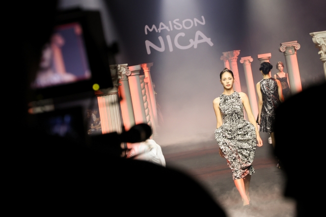 Models walk on catwalk during Maison Nica 2024 spring-summer collection at Seoul Fashion Week at Dongdaemun Design Plaza in Seoul on Sept. 6. (SFW)