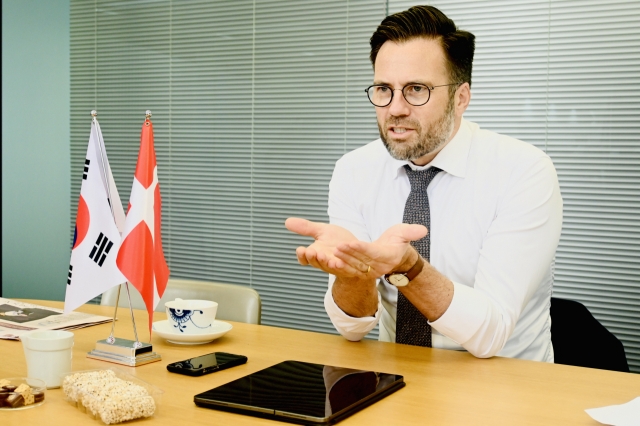 Peter Rahbaek Juel, mayor of Odense, talks about the potential for tech cooperation with Korea during an interview with The Korea Herald at the Denmark Embassy in Jung-gu, Seoul, on Sept. 25. (Sanjay Kumar/The Korea Herald)