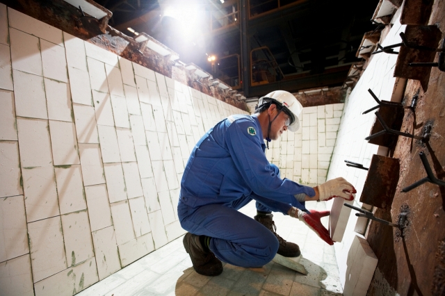 A Posco Future M worker installs refractory lining to a steel mill furnace. (Posco Future M)