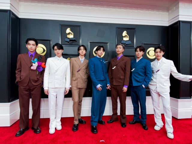 K-pop boy group BTS poses for photos during the 64th Annual Grammy Awards ceremony at the MGM Grand Garden Arena in Las Vegas on April 3, 2022. (Big Hit Music)